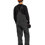Volcom Men's Roan Shell Bib Overall - A black bib overall with a white logo on the chest and two zippered pockets on the front.