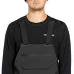 Volcom Men's Roan Shell Bib Overall - A black bib overall with a zippered fly and adjustable straps.