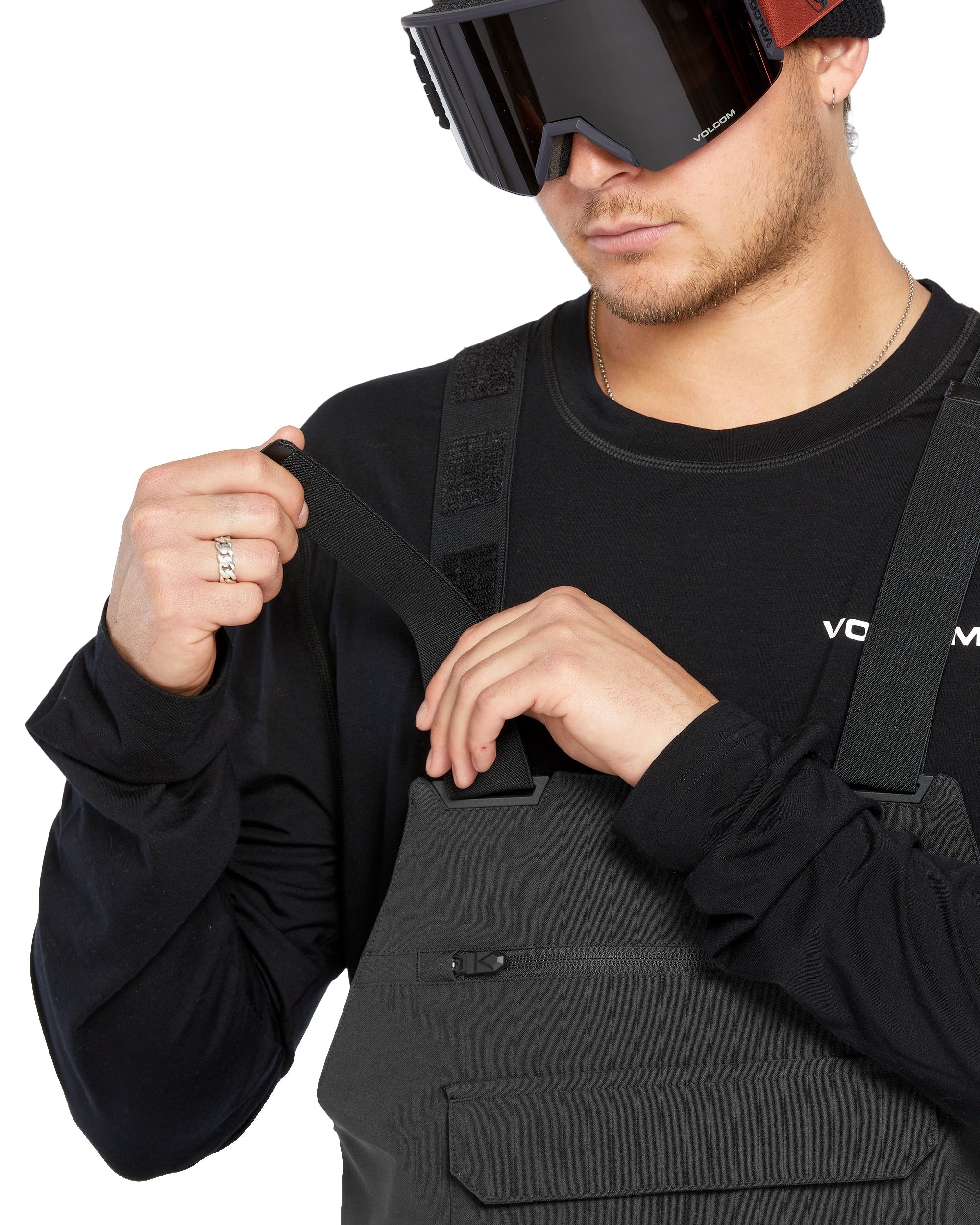Volcom Men's Roan Shell Bib Overall - A black bib overall with a zippered fly and adjustable straps.