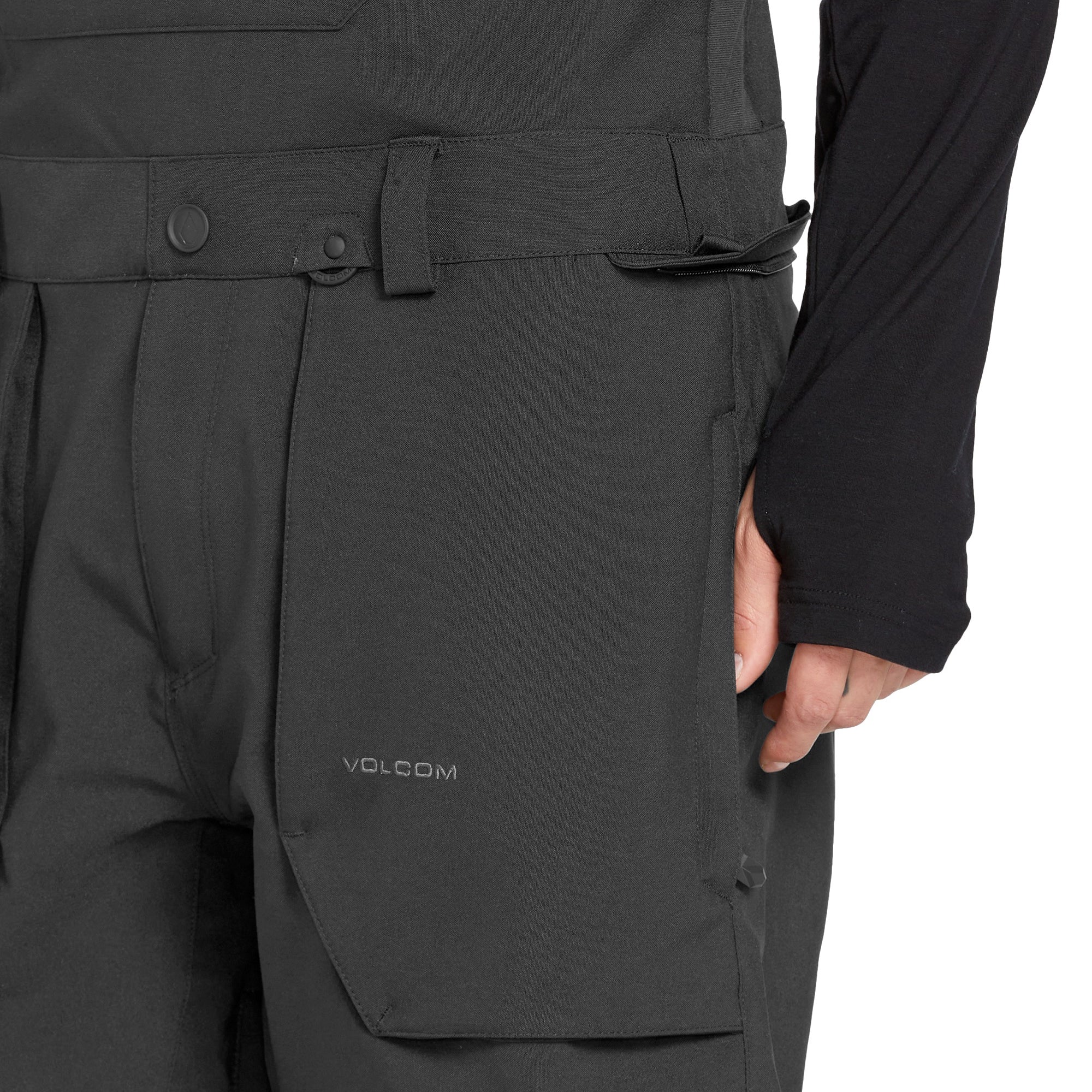 Volcom Men's Roan Shell Bib Overall - A black bib overall with a zippered fly and two front pockets.