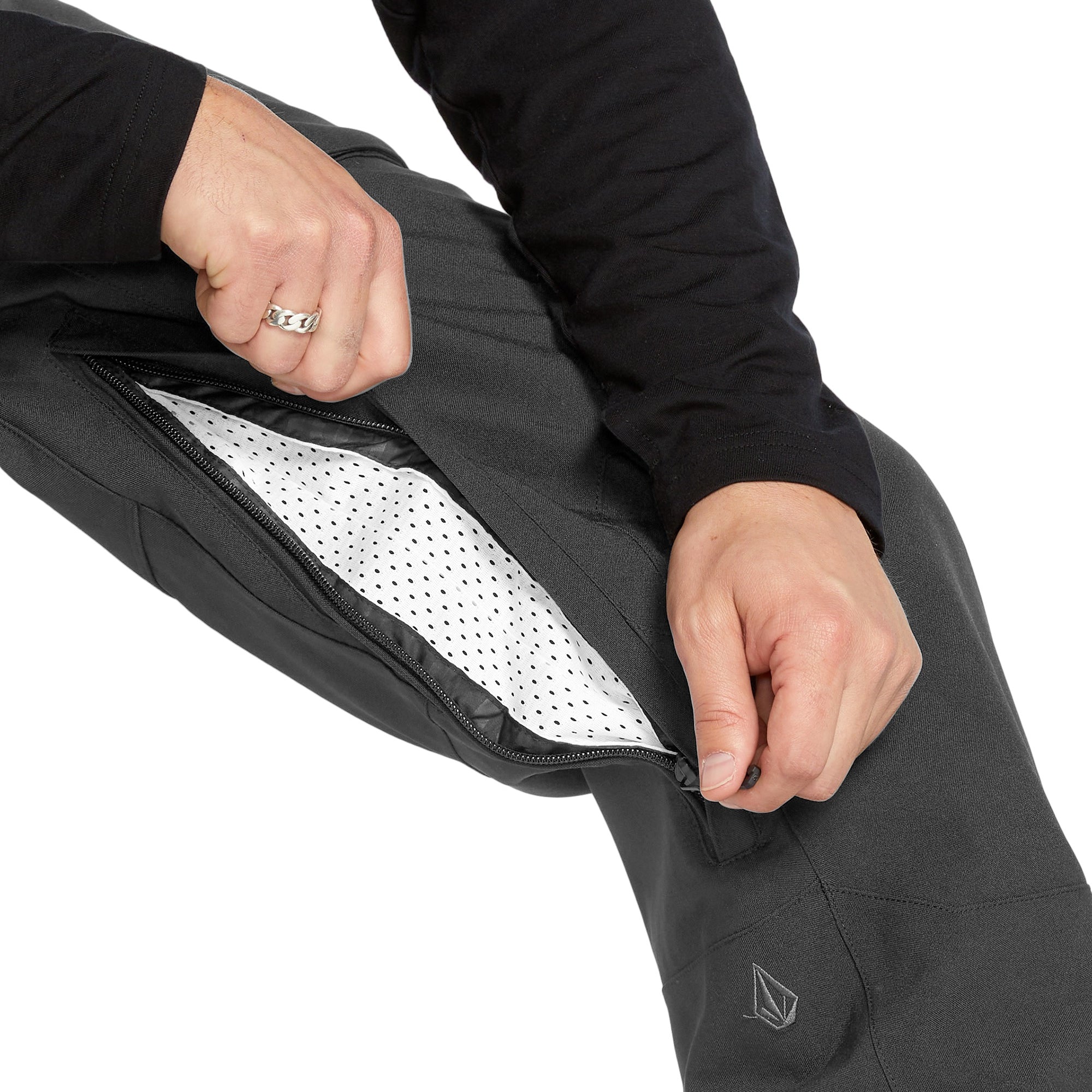 Volcom Men's Roan Shell Bib Overall - A black bib overall with a zippered fly and adjustable shoulder straps.