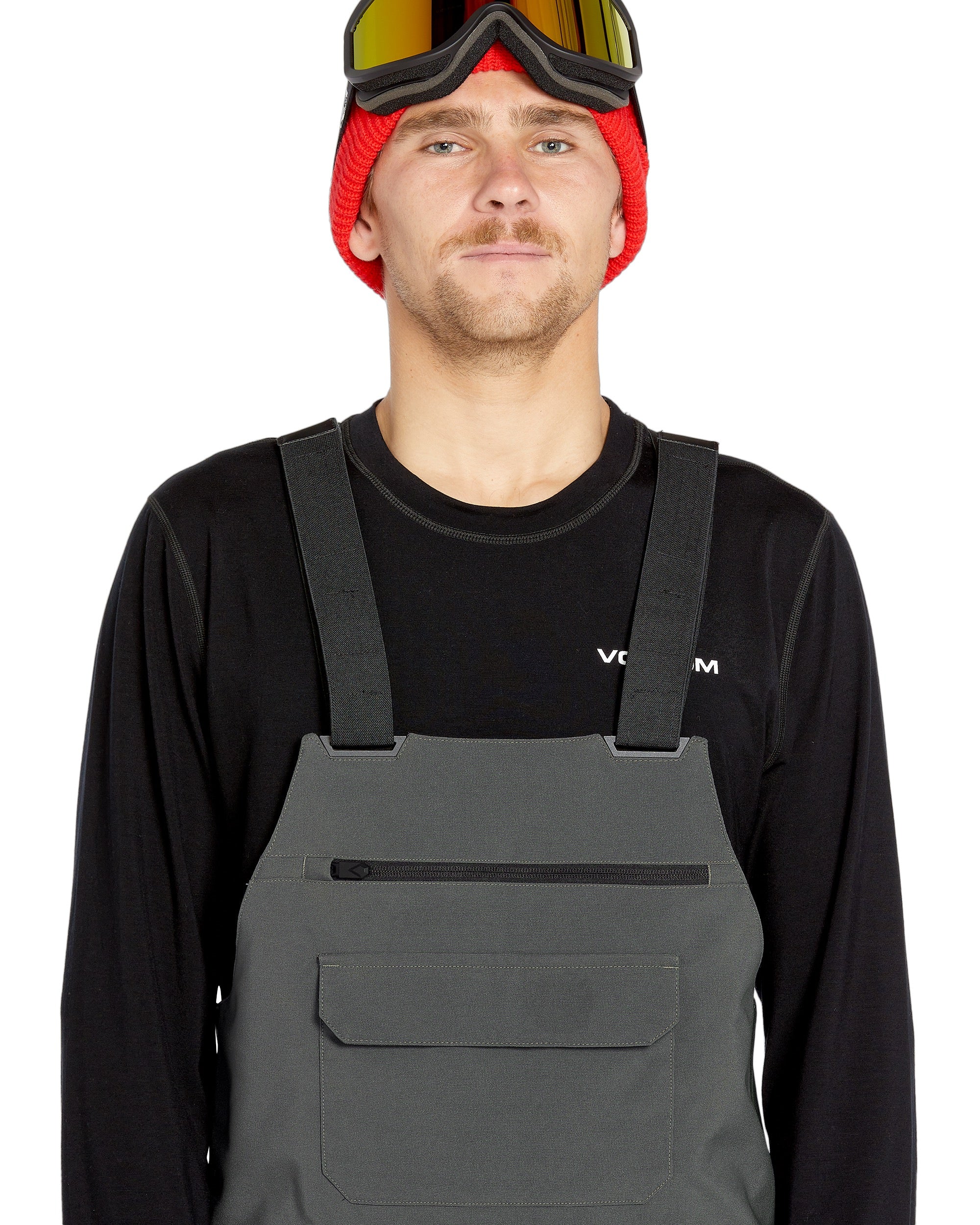 Volcom Men's Roan Shell Bib Overall - A dark gray bib overall with a zippered fly and adjustable straps.