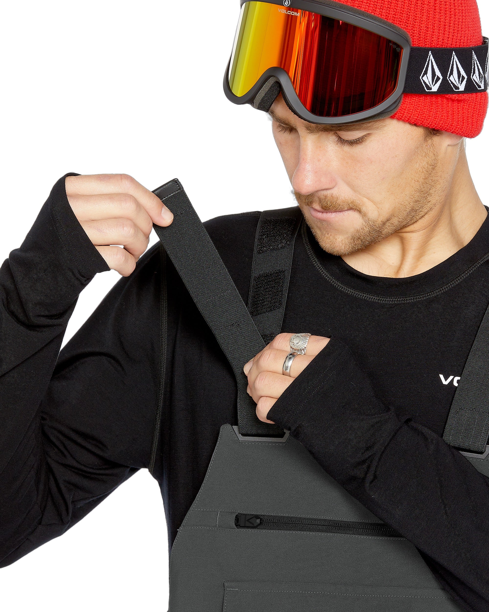 Volcom Men's Roan Shell Bib Overall - A black bib overall with a zippered fly and adjustable straps.