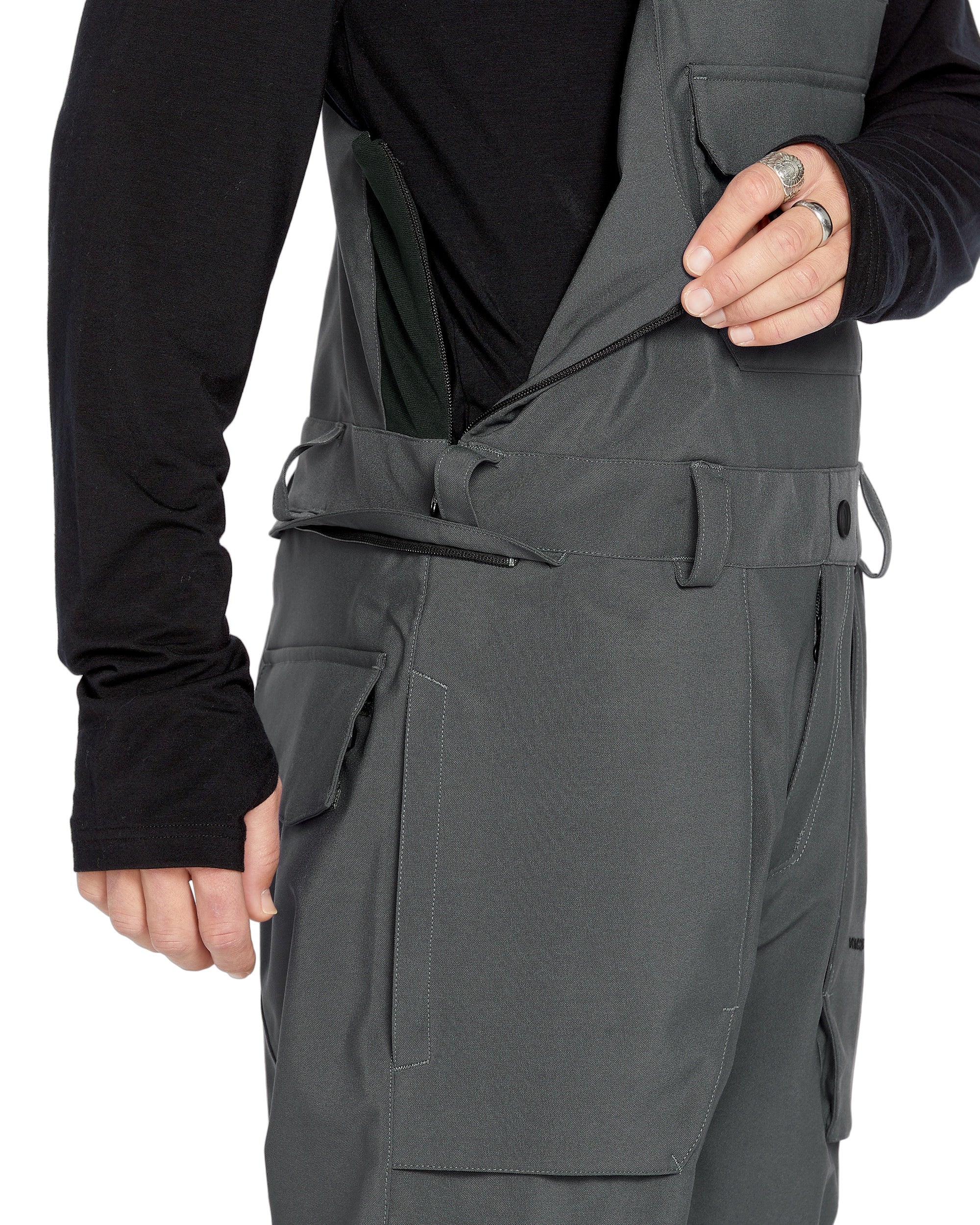 Volcom Men's Roan Shell Bib Overall - A black bib overall with a zippered front and adjustable straps.