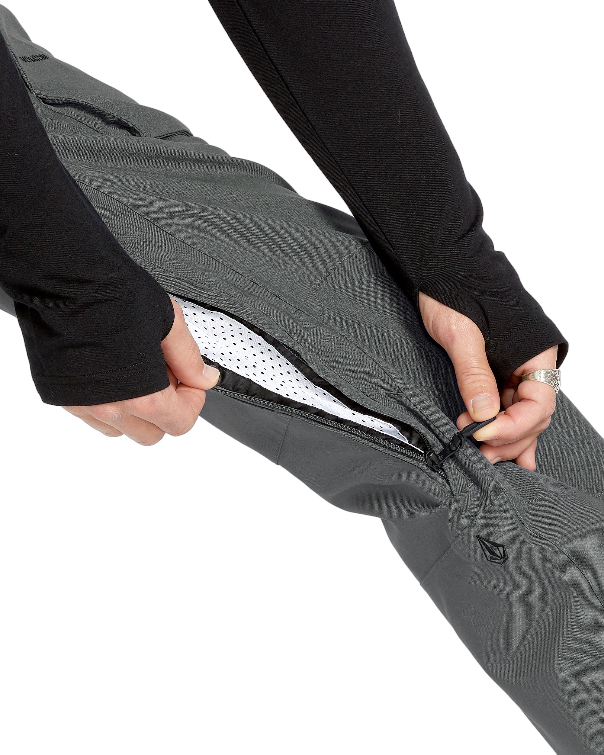 Volcom Men's Roan Shell Bib Overall - A dark gray bib overall with a zippered fly and adjustable Velcro straps at the waist and ankles.