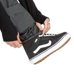 Volcom Men's Roan Shell Bib Overall - A pair of black snow pants with a white logo on the left leg.