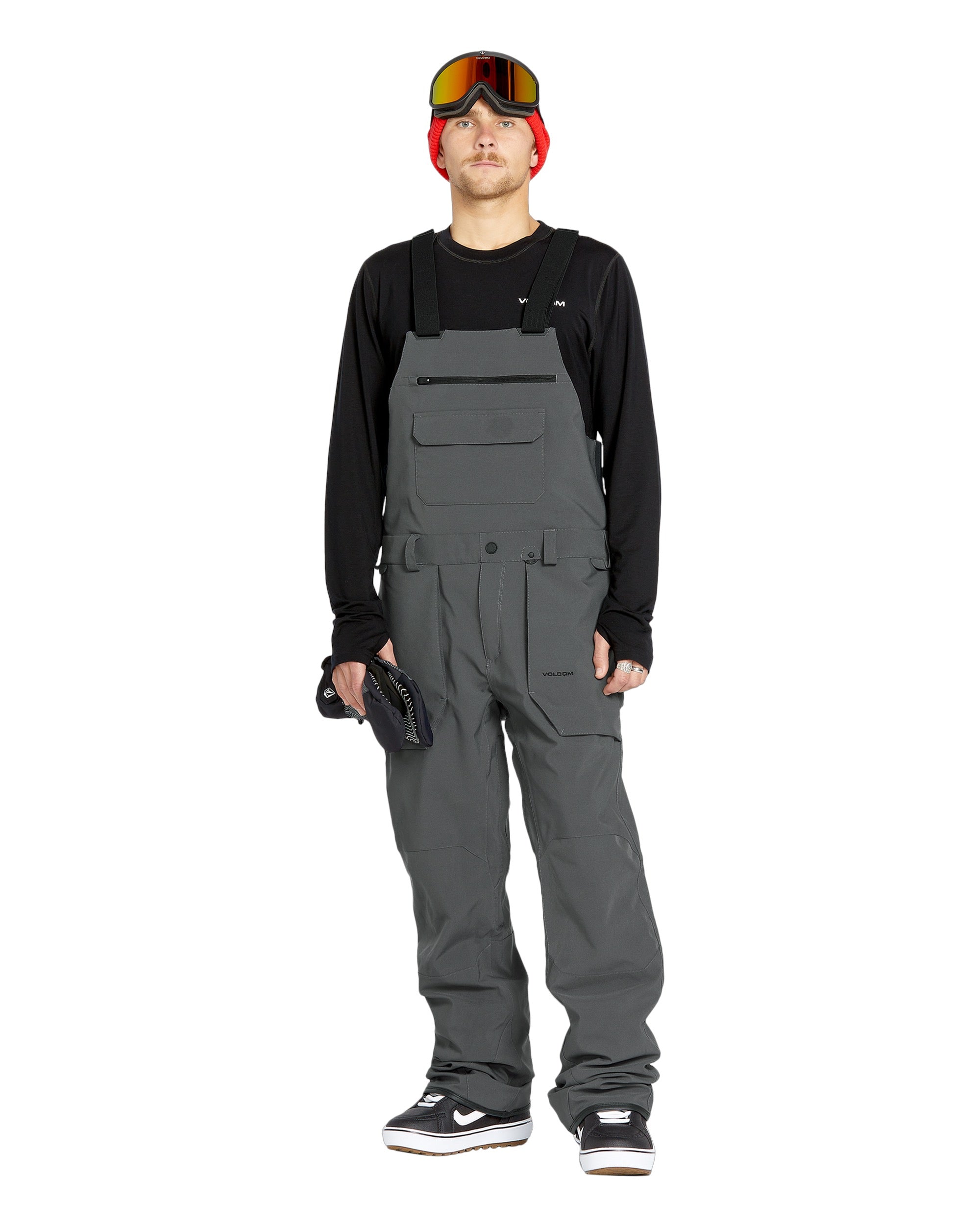 Volcom Men's Roan Shell Bib Overall - A dark gray overall with a zippered chest pocket and adjustable straps.