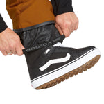 Volcom Men's Roan Shell Bib Overall - A pair of brown snow pants with a black zipper and white drawstring.