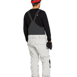 Volcom Men's Roan Shell Bib Overall - A black bib overall with a white logo on the left chest and a red zipper pull.