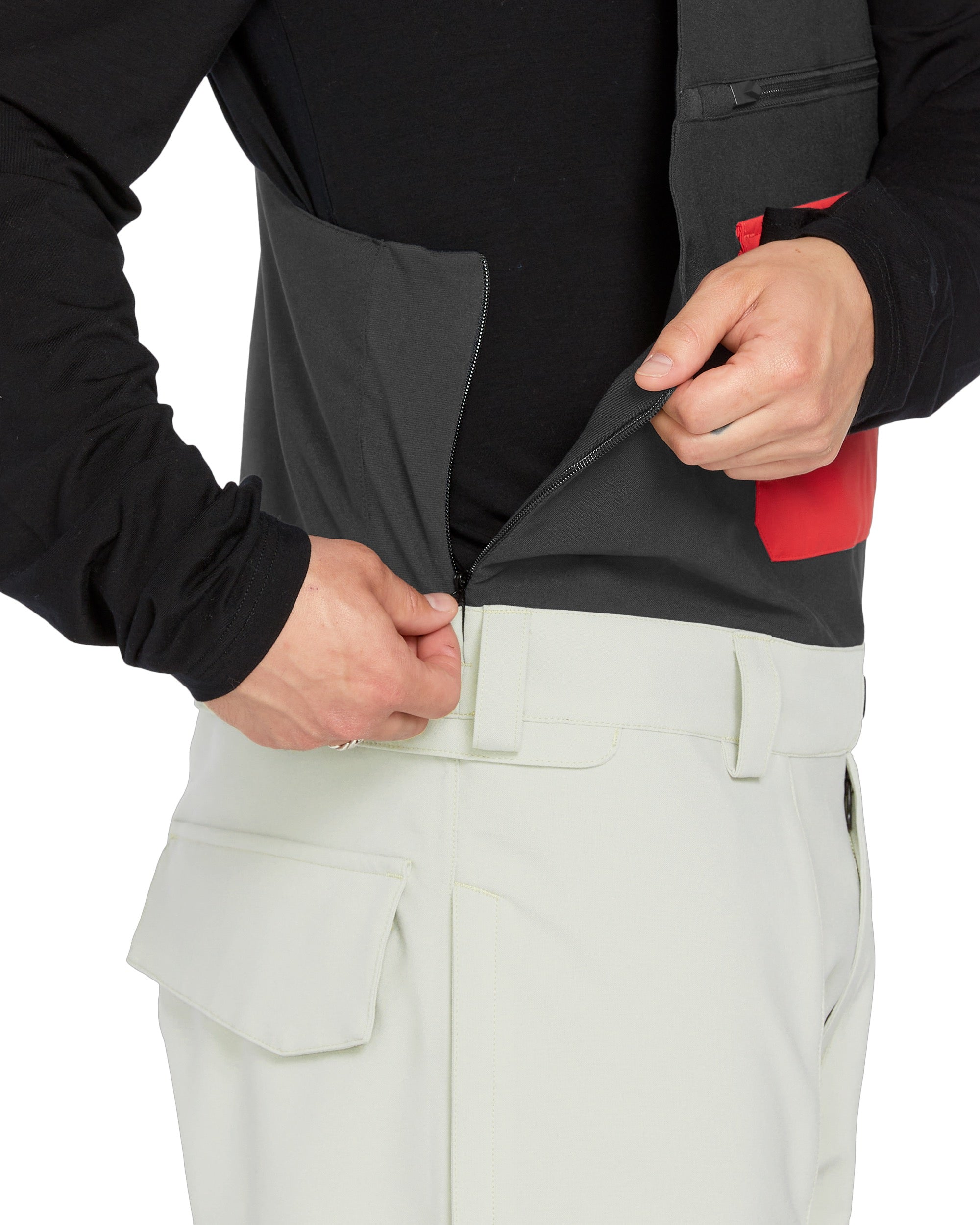 Volcom Men's Roan Shell Bib Overall - A black bib overall with a red zipper and two zippered pockets on the side.