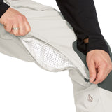 Volcom Men's Roan Shell Bib Overall - A light gray bib overall with a zippered fly and adjustable Velcro straps at the waist and ankles.