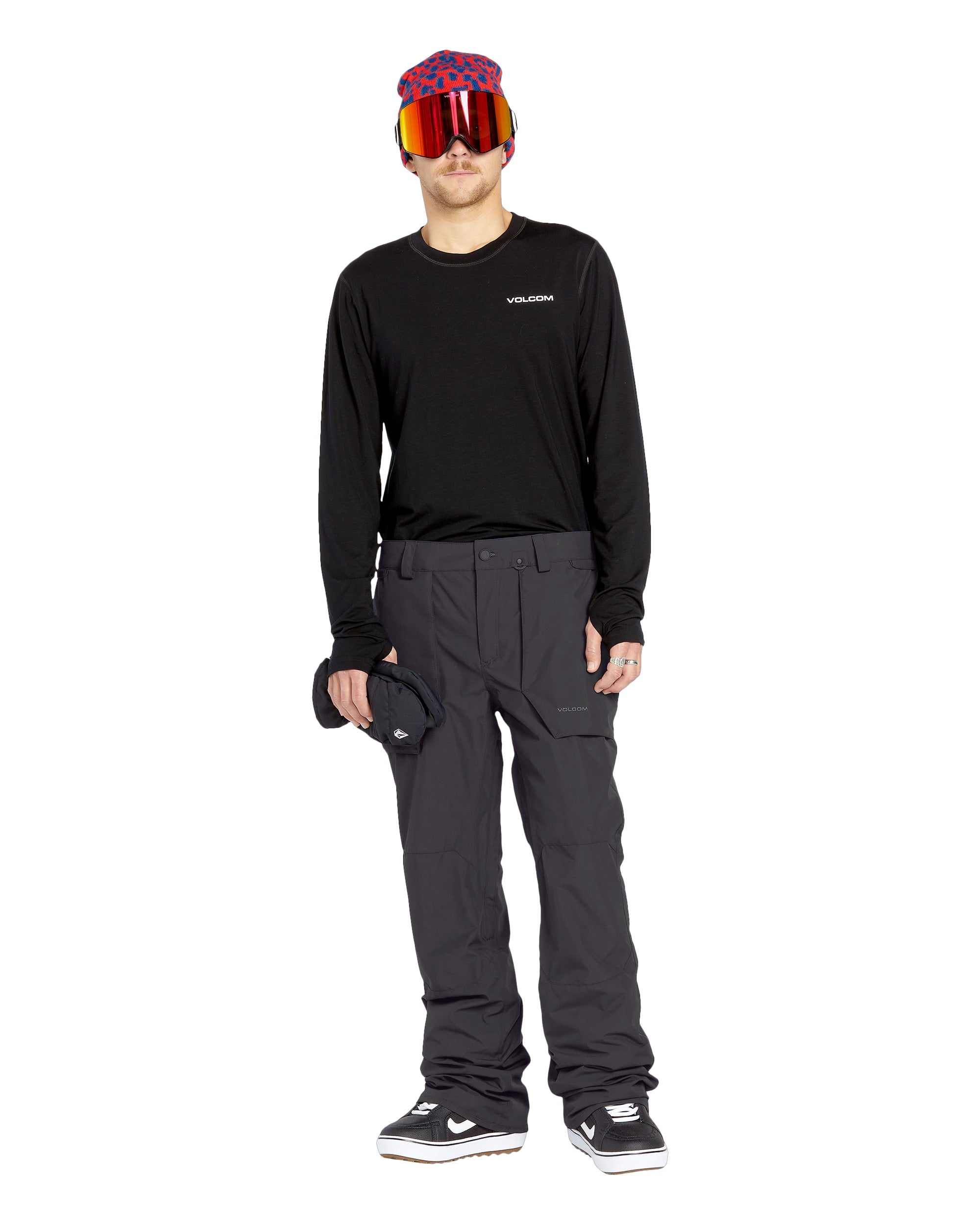 Volcom Men's Roan Shell Pant - A black snow pant with a zippered pocket on the thigh and adjustable Velcro straps at the waist.