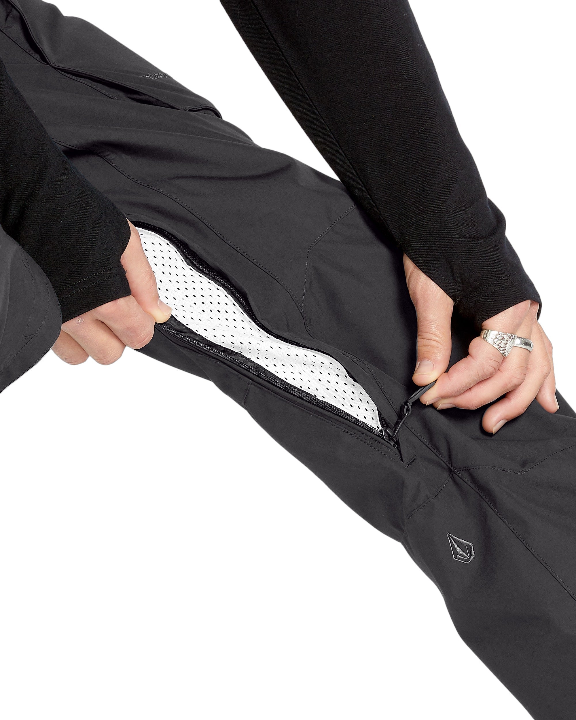 Volcom Men's Roan Shell Pant - A black waterproof ski pant with a zippered pocket on the thigh and adjustable cuffs.