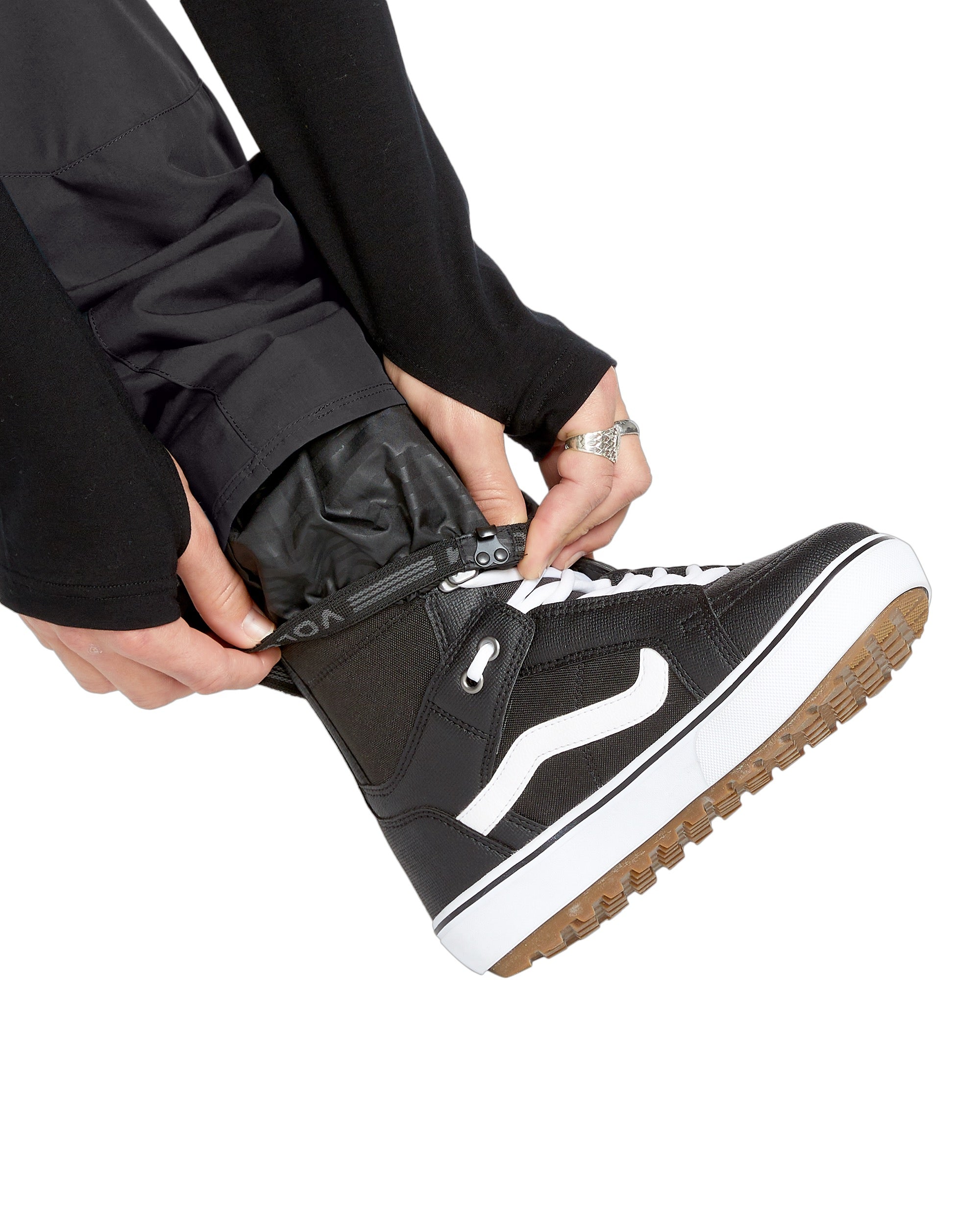 Volcom Men's Roan Shell Pant - A pair of black snow pants with a white logo on the left leg.