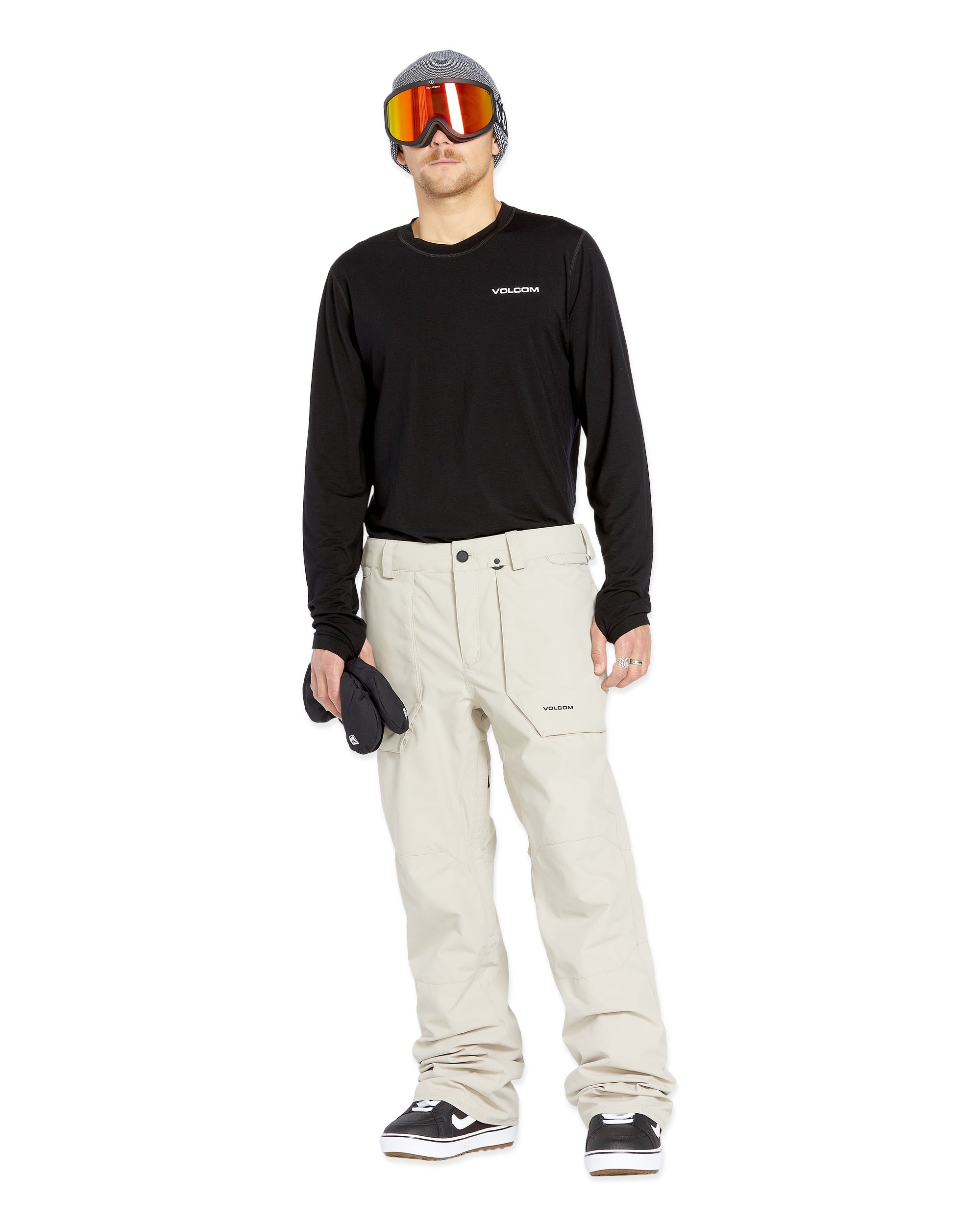 Volcom Men's Roan Shell Pant 2025 - A black snow pant with a zippered pocket on the thigh and a logo patch on the left leg.