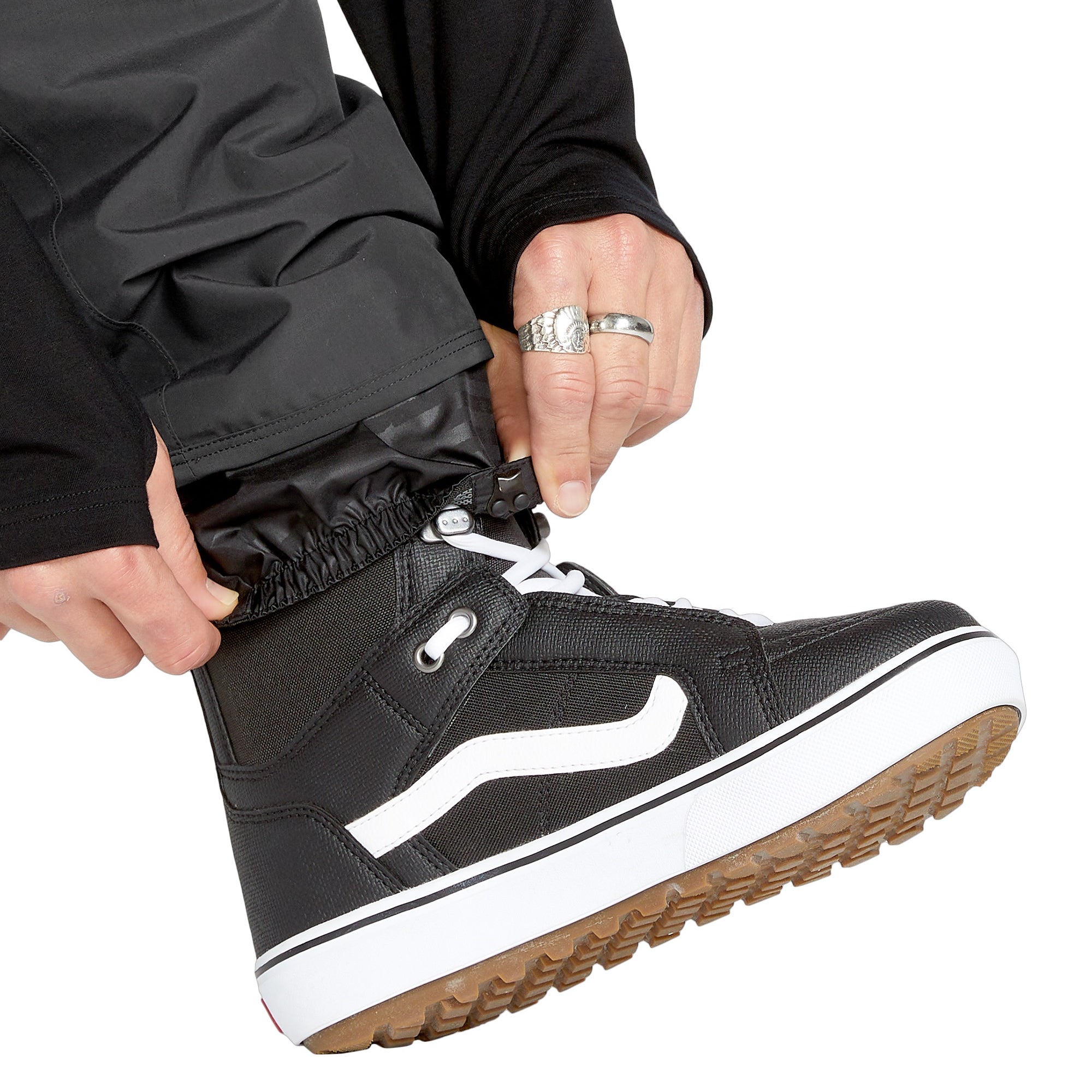 Volcom Men's V.Co Sparta Bib Overall - A black bib overall with a white logo on the chest and two zippered pockets at the waist.