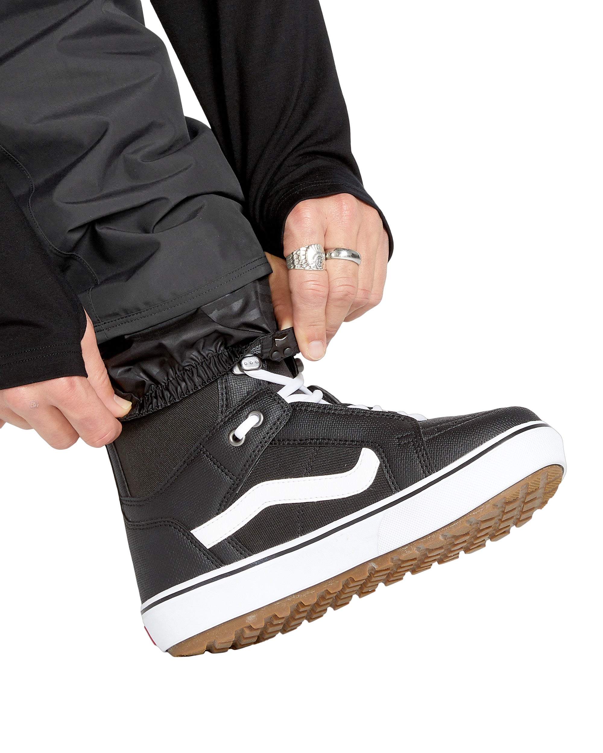 Volcom Men's V.Co Sparta Bib Overall - A black bib overall with a white logo on the chest and two zippered pockets at the waist.