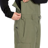 Volcom Men's V.Co Sparta Bib Overall - Olive green bib overall with black zipper and belt loops on waistband.