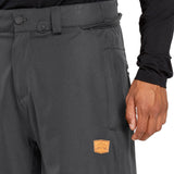 Volcom Men's Arthur 20K Shell Pant - Dark gray pants with a zippered pocket on the right thigh and a small logo patch near the bottom left leg.