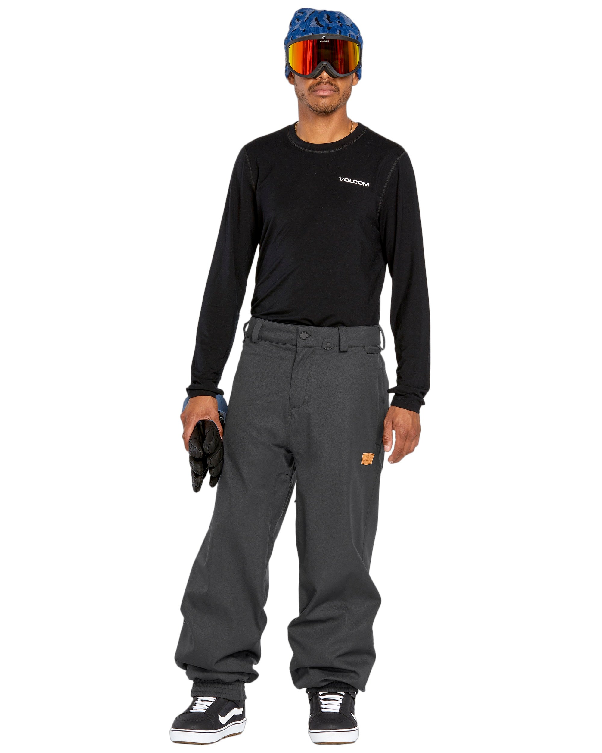 Volcom Men's Arthur 20K Shell Pant - Black snow pants with a zippered pocket on the thigh and adjustable Velcro straps at the waist.