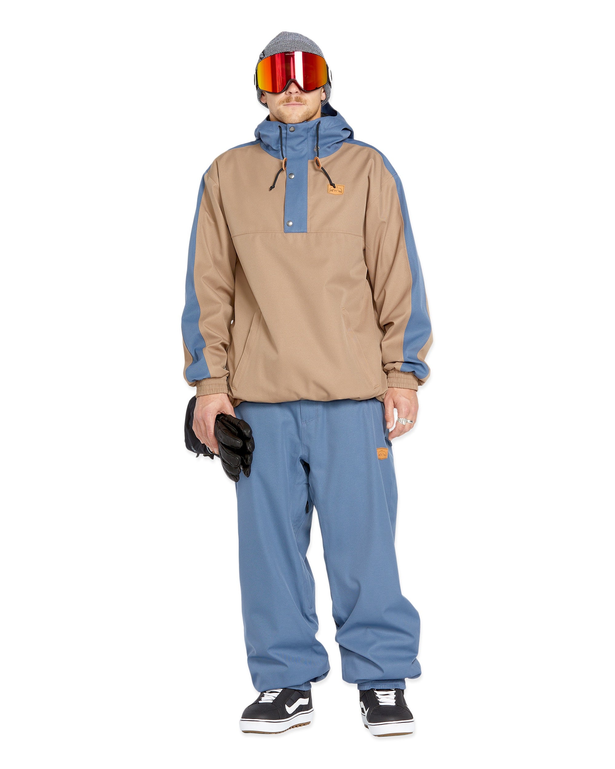 Volcom Men's Arthur 20K Shell Pant - A tan and blue snow pant with a zippered pocket on the side of the leg.