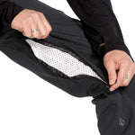 Volcom Men's Freakin' Snow Chino Pant - Black snow pants with a zippered pocket on the side and a small logo embroidered near the bottom of the leg.