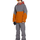 Volcom Men's Freakin' Snow Chino Pant - A pair of gray snow pants with a brown stripe down the side.