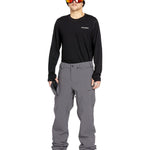 Volcom Men's Freakin' Snow Chino Pant - A pair of gray snow pants with a subtle pattern and multiple pockets.