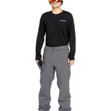 Volcom Men's Freakin' Snow Chino Pant - A pair of gray snow pants with a subtle pattern and multiple pockets.