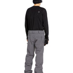 Volcom Men's Freakin' Snow Chino Pant - A pair of gray snow pants with a subtle white logo on the upper left thigh.