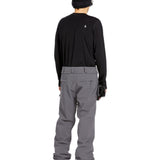 Volcom Men's Freakin' Snow Chino Pant - A pair of gray snow pants with a subtle white logo on the upper left thigh.