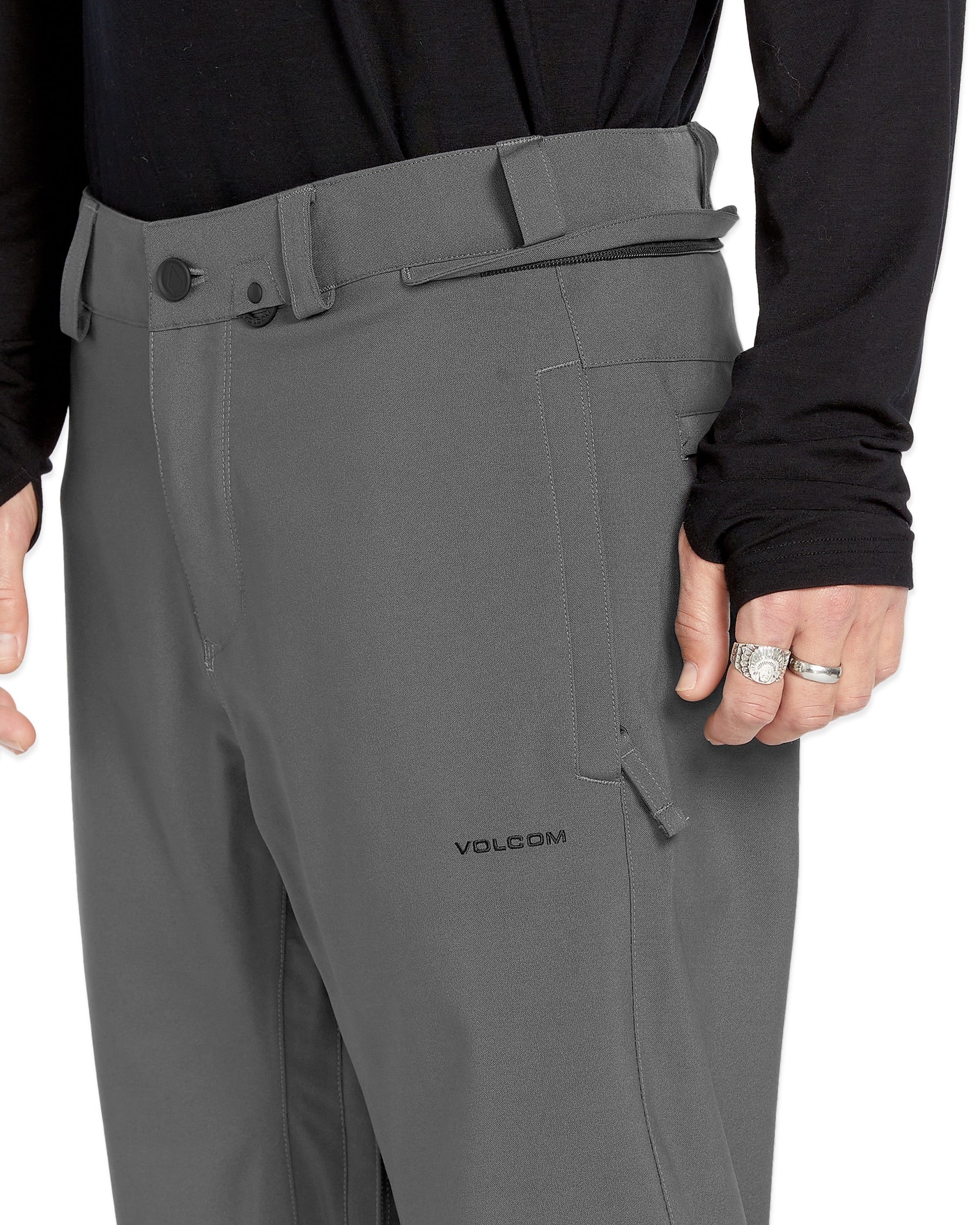 Volcom Men's Freakin' Snow Chino Pant - A pair of gray snow pants with a zippered fly and belt loops.