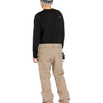 Volcom Men's Freakin' Snow Chino Pant - A pair of khaki chinos with a black stripe on the side and a small white logo near the bottom.