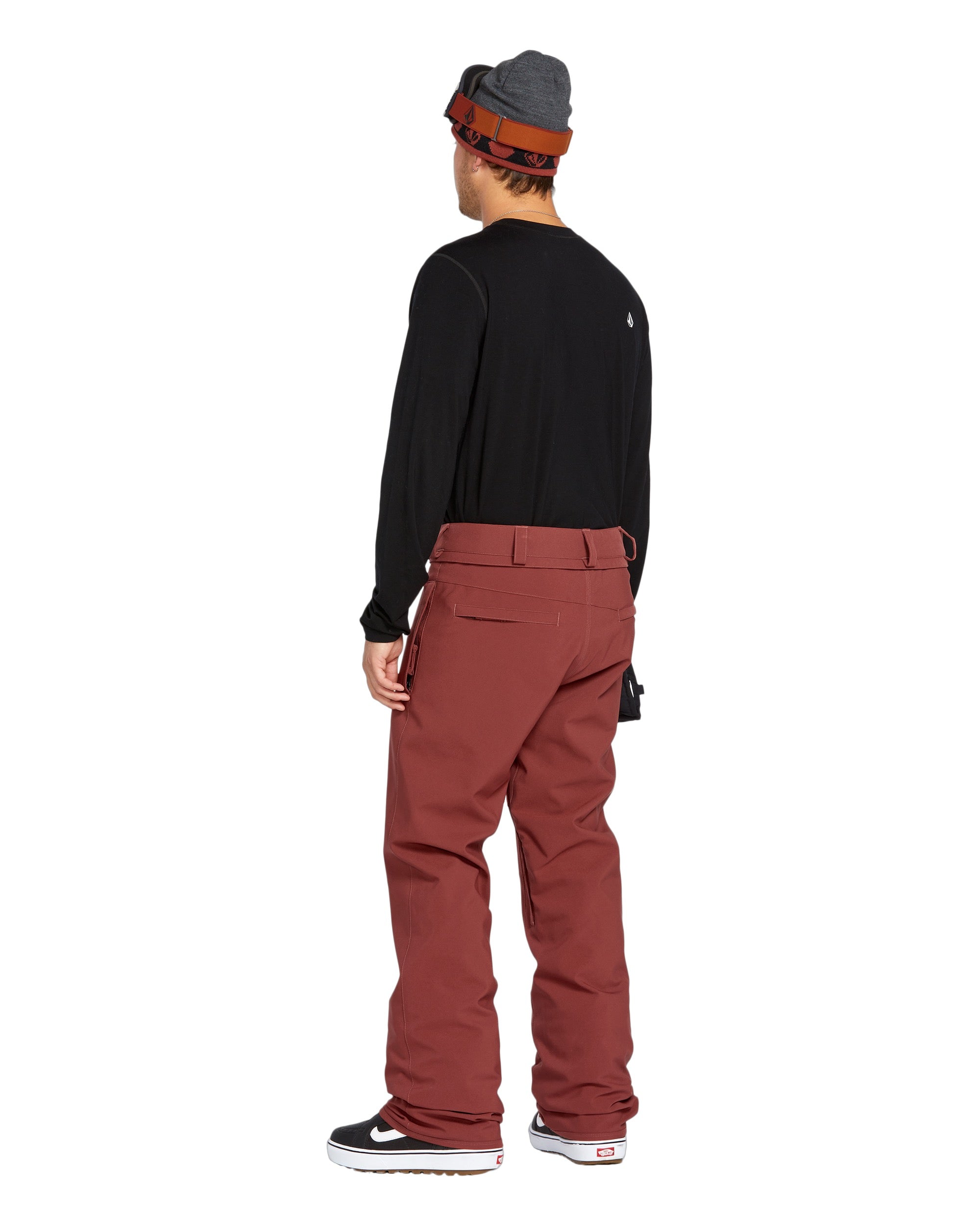 Volcom Men's Freakin' Snow Chino Pant - A pair of brown snow pants with a subtle white stripe on the side.