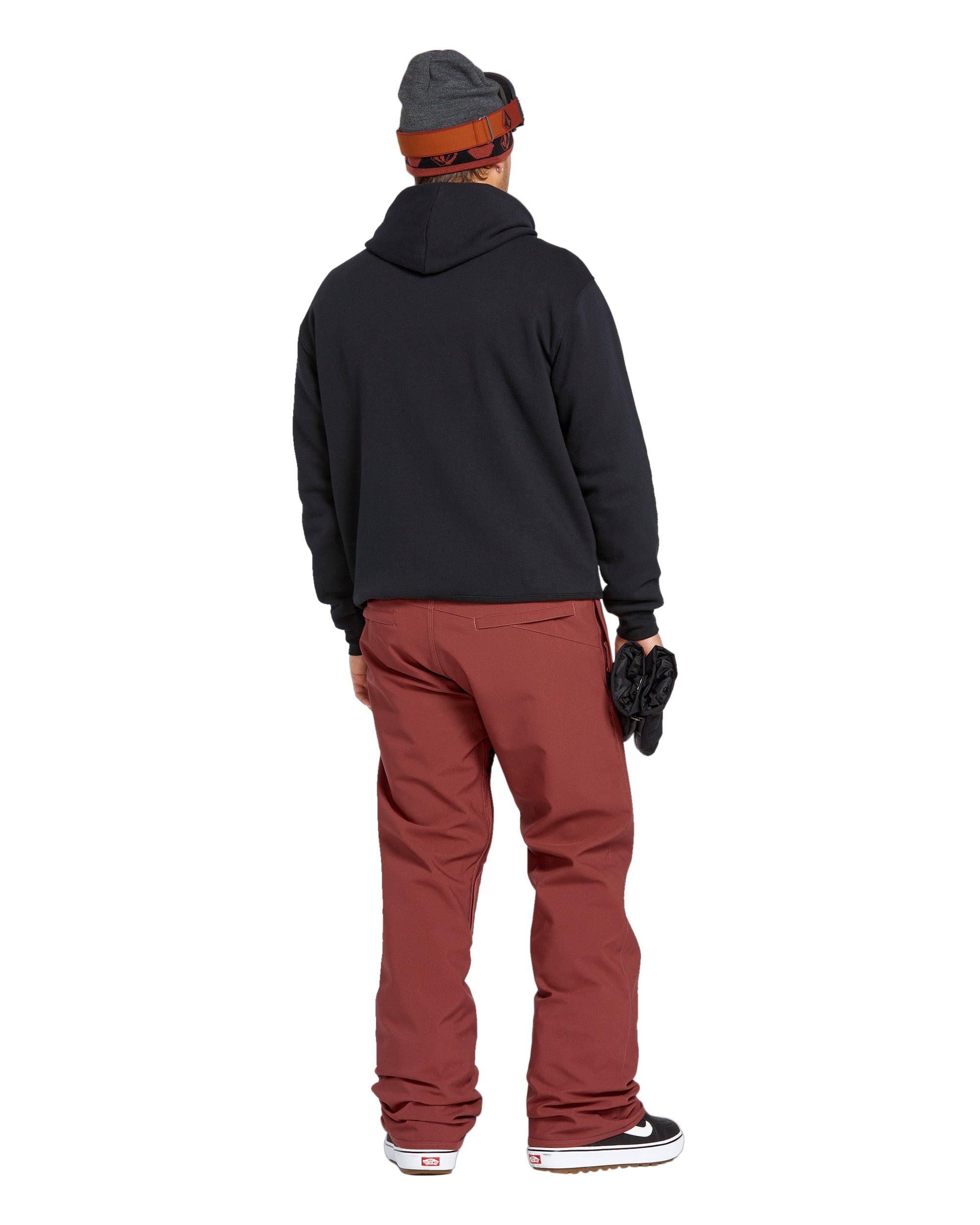 Volcom Men's Freakin' Snow Chino Pant - A pair of brown snow pants with a zippered pocket on the side.