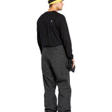 Volcom Men's 5 Pocket Shell Pant - Black pants with white logo on left thigh pocket.
