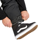 Volcom Men's 5-Pocket Shell Pant - Black pants with a subtle white logo on the left thigh and black drawstrings at the waist.