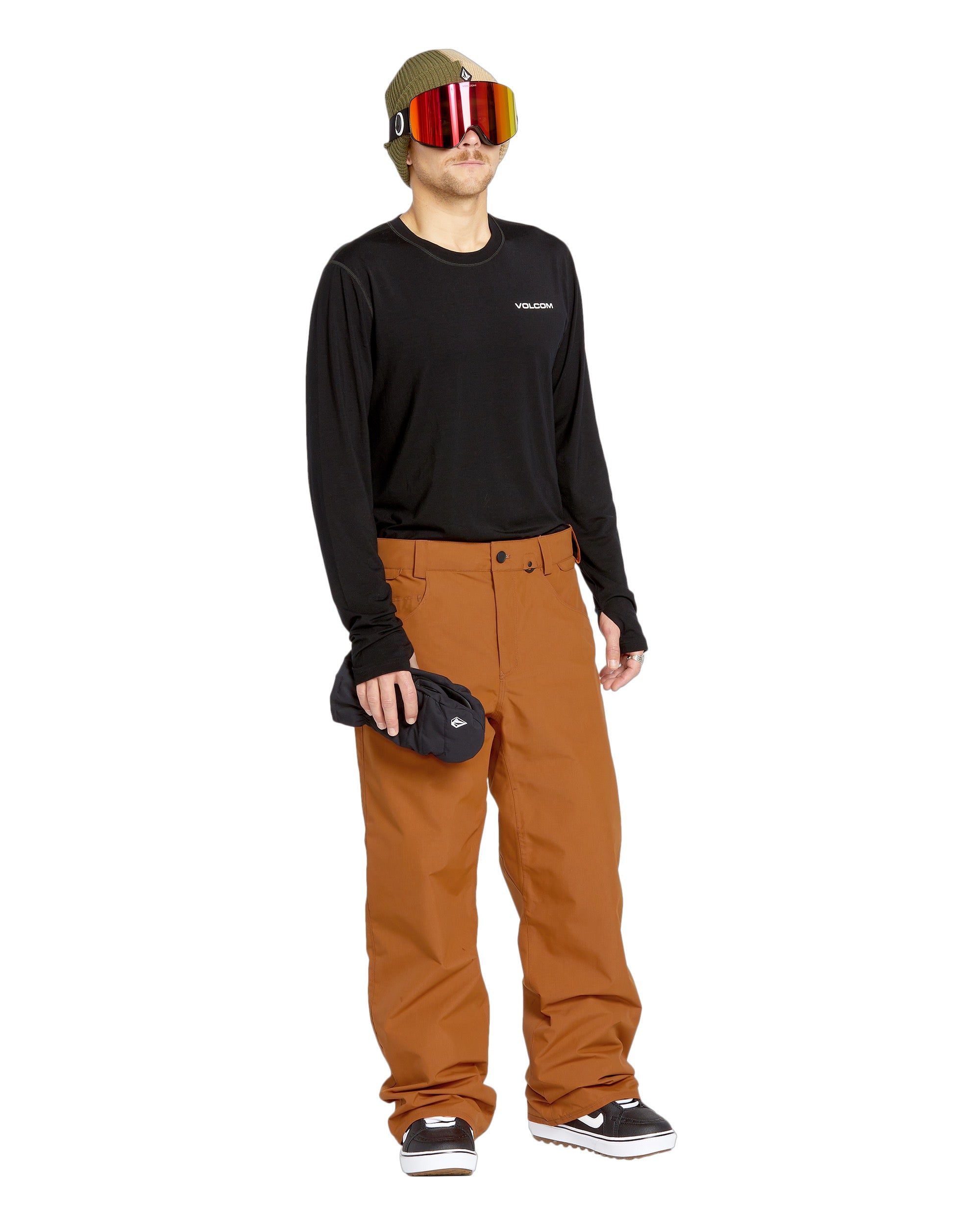 Volcom Men's 5 Pocket Shell Pant - A pair of khaki-colored snow pants with five pockets and a zippered fly.