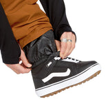 Volcom Men's 5-Pocket Shell Pant - A pair of black pants with five pockets, featuring a zippered fly and elastic waistband.