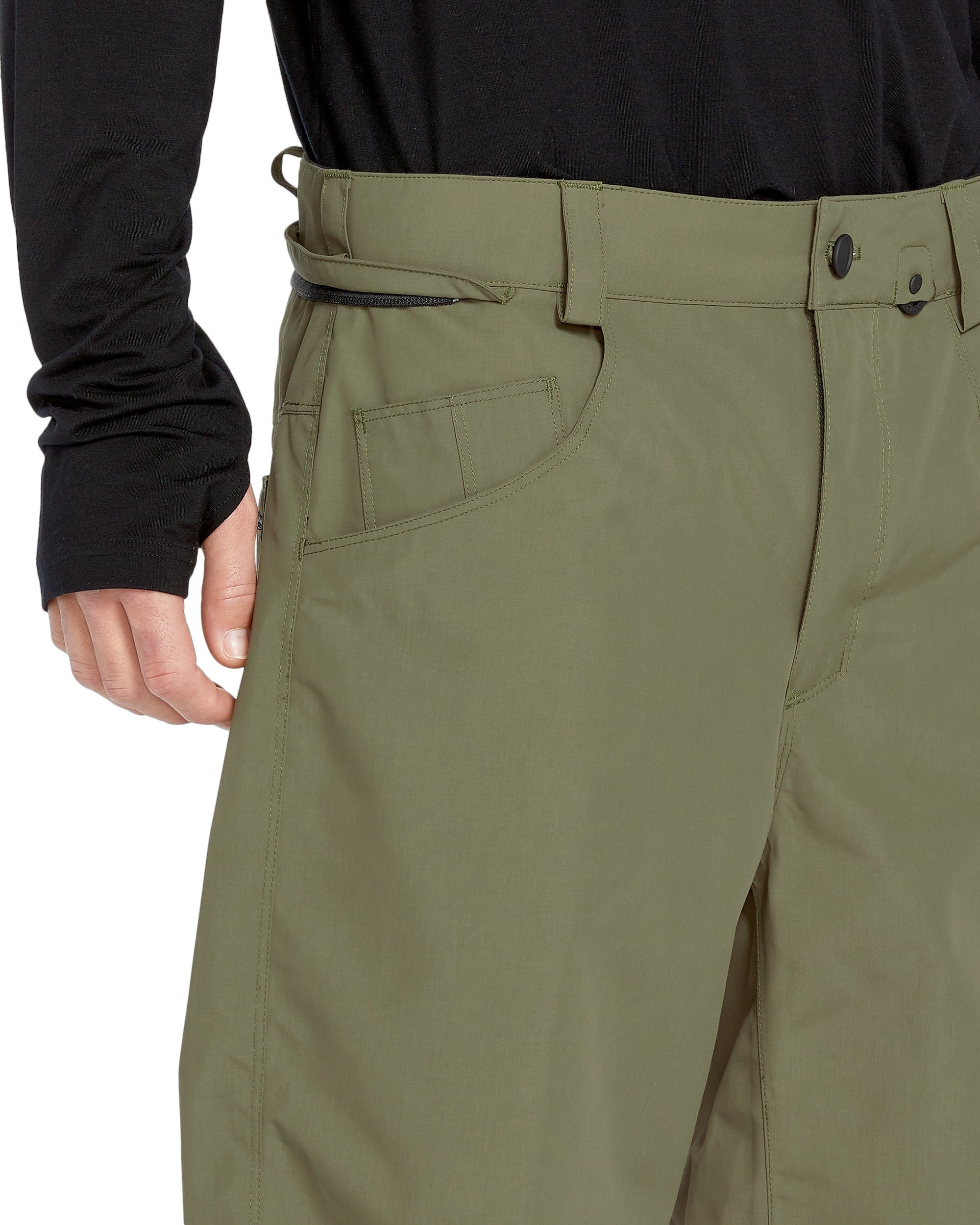 Volcom Men's 5 Pocket Shell Pant - A pair of khaki green pants with five pockets and a belt loop on the waistband.