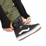 Volcom Men's 5-Pocket Shell Pant - A pair of olive green pants with five pockets, featuring a zip fly and elastic waistband.