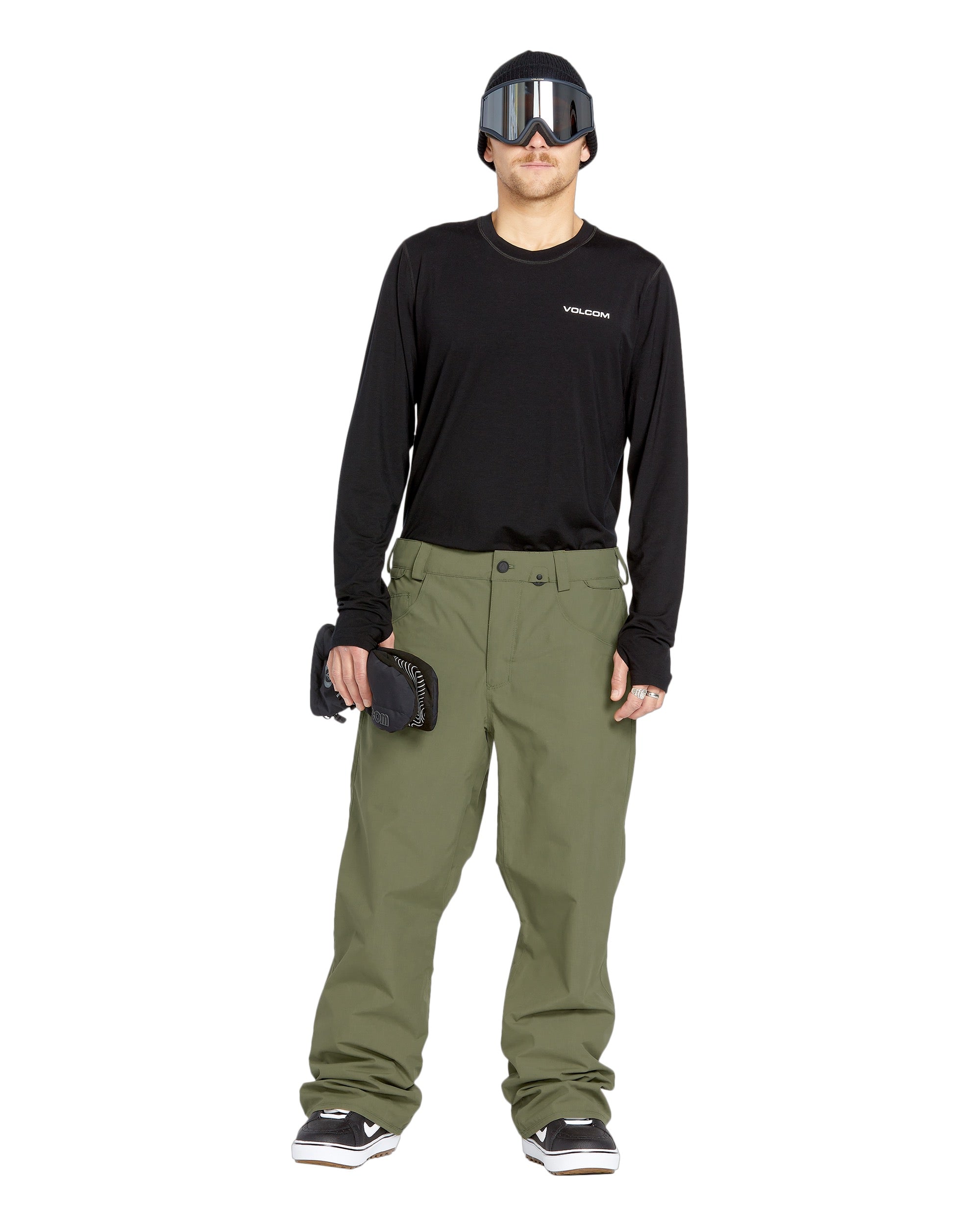 Volcom Men's 5 Pocket Shell Pant - Black pants with white logo on left thigh and two zippered pockets on right side.
