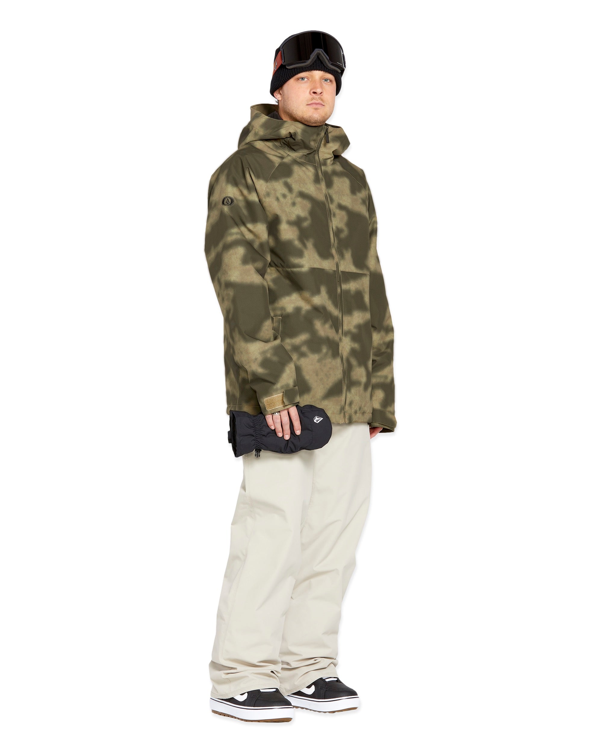 Volcom Men's 5 Pocket Shell Pant - A dark green snow pant with a zippered pocket on each thigh and two side pockets.