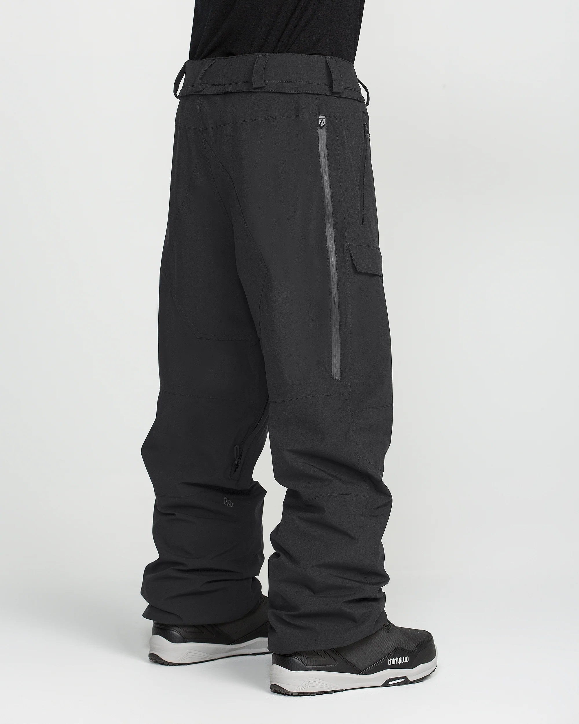 Black snowboarding pants with cargo pockets and elastic boot-cuff hems