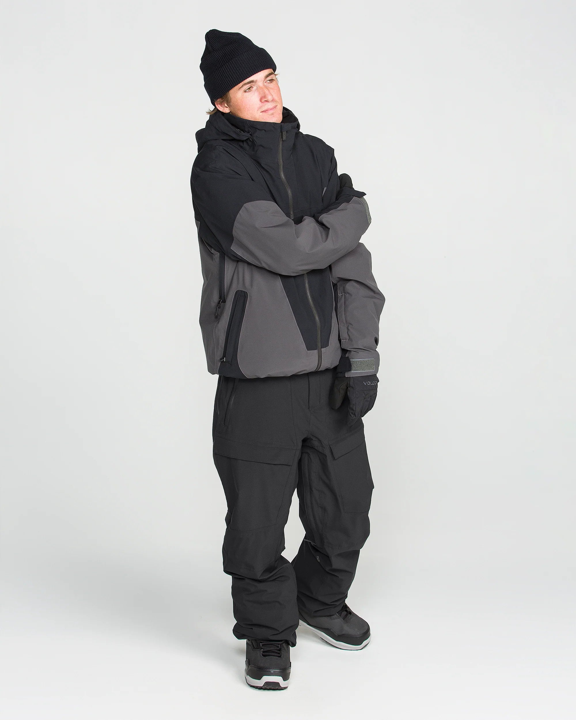 Black snowboard pants with tapered legs and reinforced ankle openings.