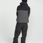 Black snowboard pants with ankle cuffs and cargo-style utility pockets.