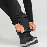 Black snowboard pants with zip cuff at the ankle and secure boot fit.