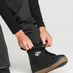 Black bib overall ankle cuffs and foot strap with rubberized logo patch