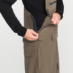 Teak bib overall with front cargo pockets and zipper side opening