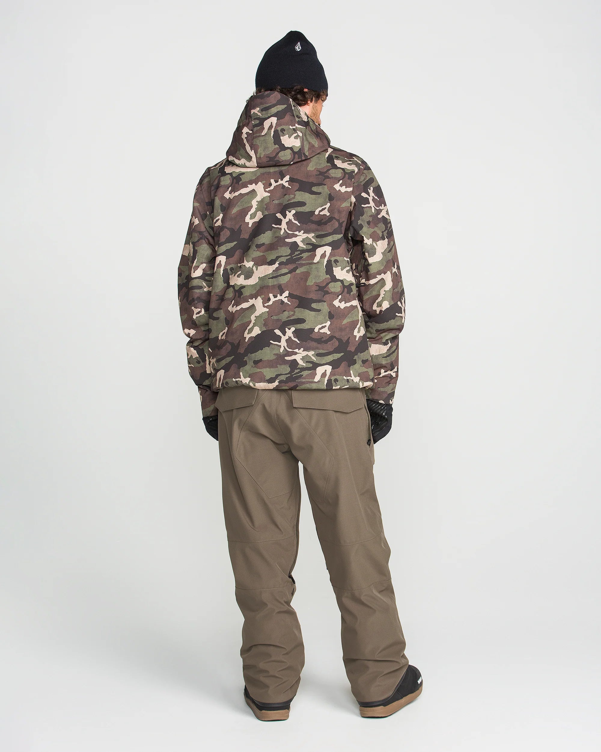 Brown bib overall with adjustable straps, cargo pockets, and wide straight legs
